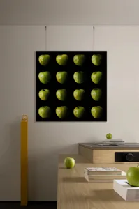 A grid of green apples arranged in a square pattern.
