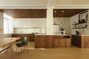 An interior design featuring modern, wooden furniture with a contemporary design.