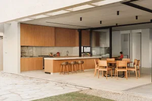 A modern interior design space featuring wooden furniture and materials.