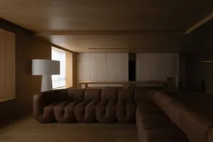 Modern minimalist living room featuring wooden walls, a brown sofa, and a floor lamp.