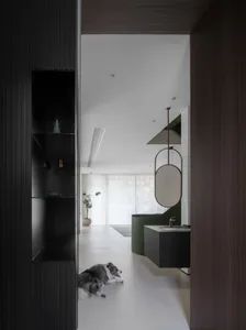 A minimalist modern bathroom featuring concrete features