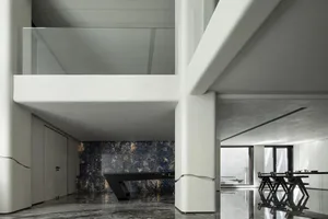 Contemporary living room featuring modern marble finishes and minimalist design.