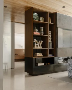 A modern interior room featuring a wooden shelf with various decorative items and books.