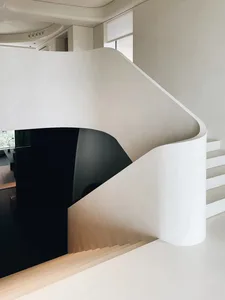 White curved white wall in a modern interior design setting