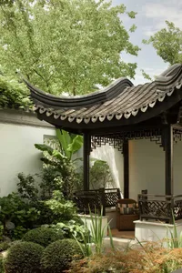A serene Chinese landscape garden featuring a traditional tile-roof gazebo.