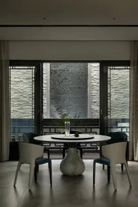 Modern dining room with marble table and chairs