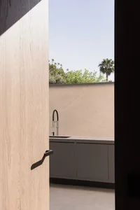 Modern kitchen with concrete countertops and minimalist design
