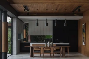 Modern living room featuring wooden furniture and decor.