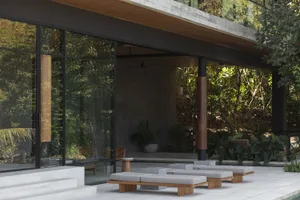 Contemporary residential interior featuring modern minimalist design, wood and concrete finishes, and a seamless integration 