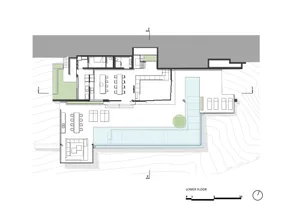 2D architectural drawing of a modern residential floor plan featuring metallic, glass, and concrete materials.