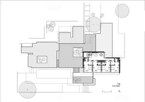 Floor plan of a modern residential building with concrete materials.