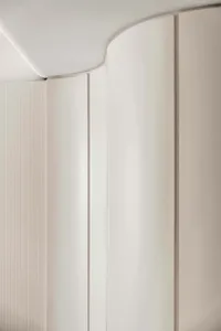 A photograph of modern interior design featuring matte-finished paper elements.