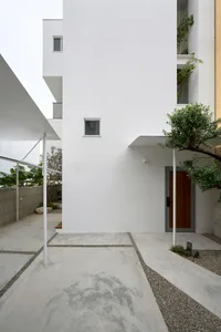 Concrete entrance with minimalist design and modern architectural features.