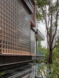 Modern building exterior featuring glass blocks with a contemporary design.