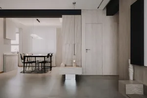 Modern minimalist kitchen featuring a concrete floor and walls.