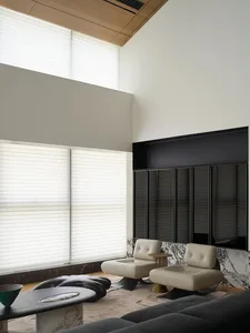 A modern living room with marble accents and minimalist furniture.