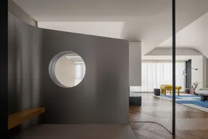 Modern living room featuring wooden and concrete elements.