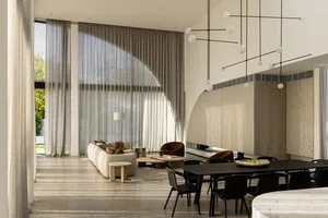 A modern interior design featuring a glass and concrete dining and living space with a minimalist aesthetic.