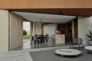 Modern residential interior with concrete and wooden materials