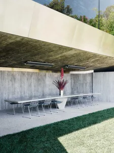 Outdoor dining area with modern concrete and metal elements