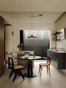Modern kitchen with marble countertops and wooden shelves