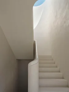 Modern concrete stairs with a smooth, minimalist design.