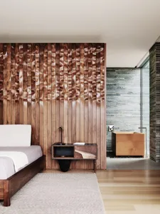 Modern bedroom featuring clean, striped wood wall and white rug.