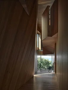 Photograph of a modern architectural interior with wooden materials.