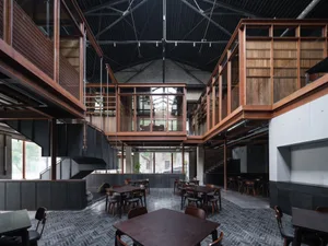 Modern cafe interior with concrete walls and industrial design