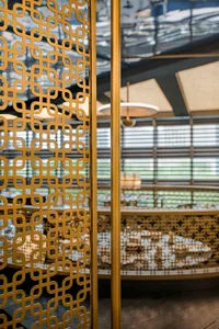 Modern interior design featuring metallic pattern with geometric shapes.