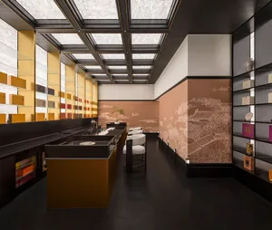 Modern retail shop interior with black wooden walls, yellow accents, and a skylight ceiling.