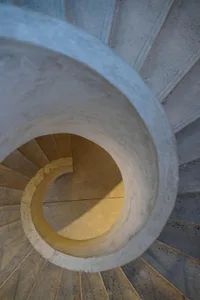 Industrial-style concrete staircase viewed from above.