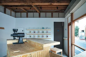 Coffee shop interior with industrial-style counter made of wood