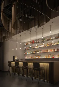 Modern bar featuring metal, wood, and glass elements.