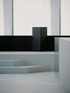 A modern minimalist interior design featuring a concrete staircase with clean lines and geometric shapes.