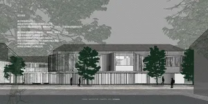 A modern building with concrete and glass exterior features.