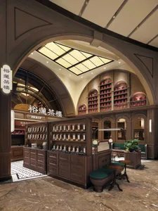 A modern coffee shop interior featuring wooden materials and a high ceiling with skylights.