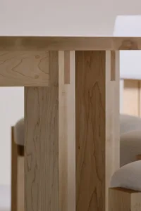 Close-up of minimalist wooden table leg details