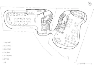 A detailed architectural plan of a restaurant interior showing seating arrangements, balconies, a kitchen, restrooms, an offi