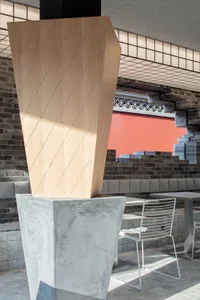 Modern interior design featuring concrete and wood materials