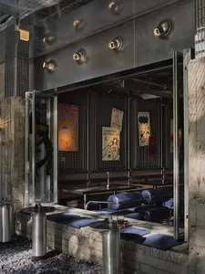 Industrial-style retail storefront with metal and concrete materials