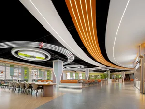 Interior view of a modern restaurant featuring concrete flooring and minimalist design.