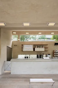 Concrete minimalist coffee shop counter with modern design
