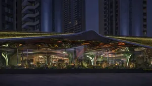 A modern restaurant with a glazed exterior at night, featuring sleek lines and led lighting.