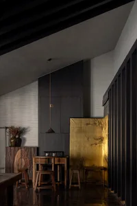 Industrial restaurant interior with metallic and wooden materials