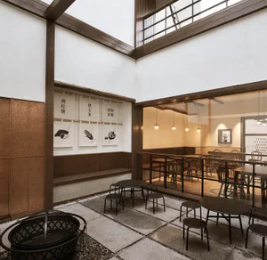 Modern coffee shop interior with wood and concrete features