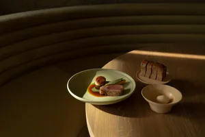 A modern food presentation featuring wood elements.