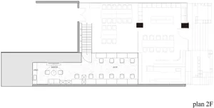 Floor plan detailing an office space layout with desks, chairs, and meeting areas.