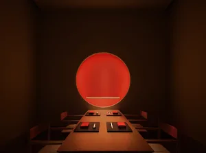 Modern dining room with a wooden table and chairs.