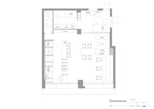 Minimalist coffee shop layout with work tables, benches, and seating arrangements.